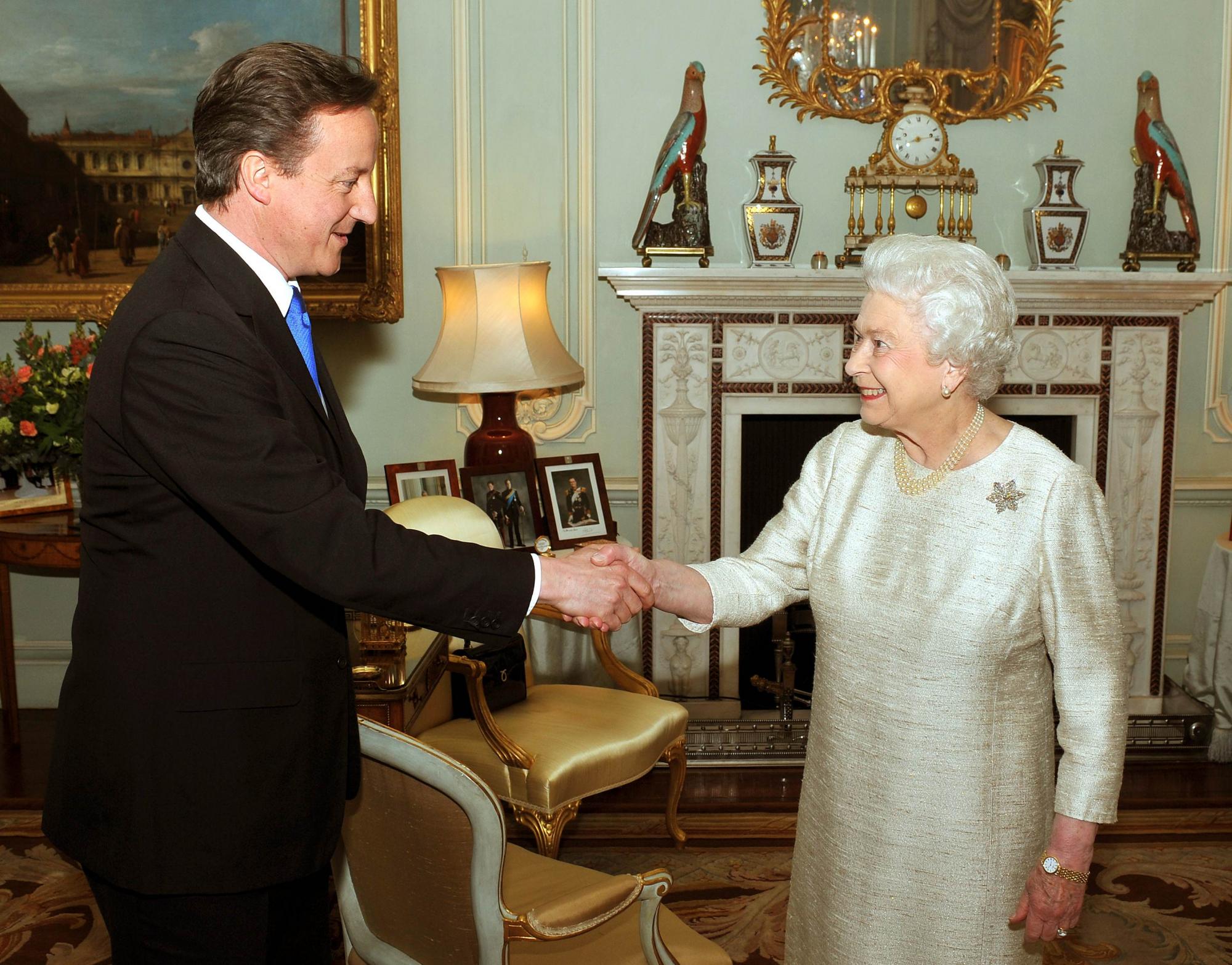 New PM Cameron announces coalition with Lib Dems