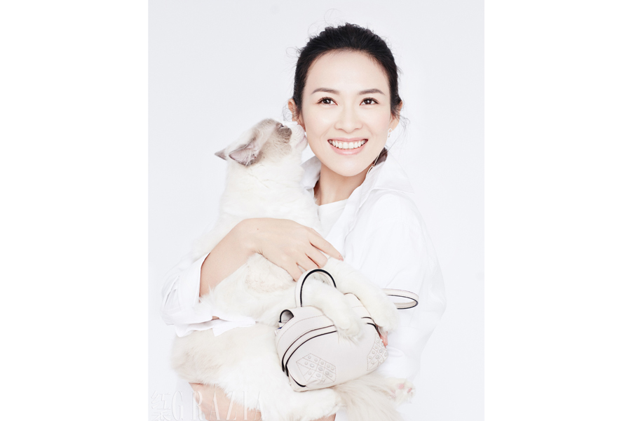 Actress Zhang Ziyi poses for fashion magazine
