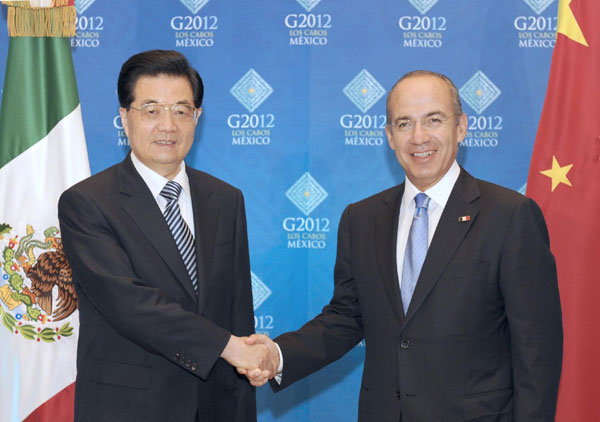 Hu calls for new impetus by G20