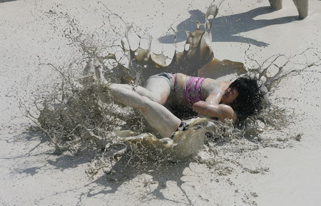 Mud and guts in women's mud wrestling contest