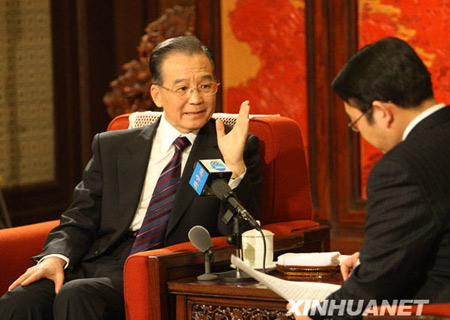 Wen stands firm on yuan