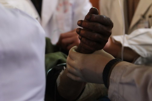 115 survivors rescued from flooded mine, 38 still trapped