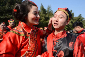 Alibaba staff hold group wedding