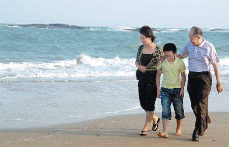 Couples tie knot across Straits