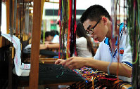 Sichuan in stitches