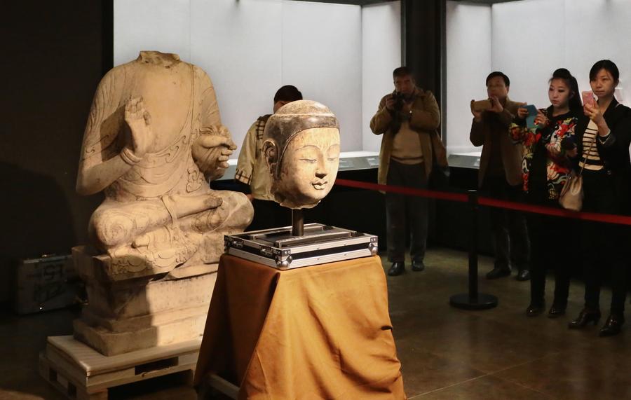 Stolen Buddha statue head arrives in Hebei museum