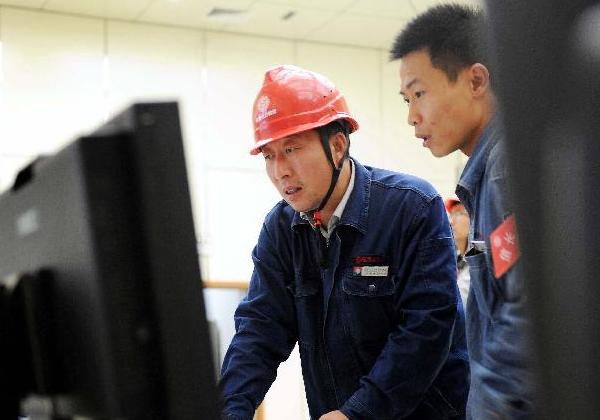 尤天軍：26年執(zhí)著堅守　苦修成“工人教授”
