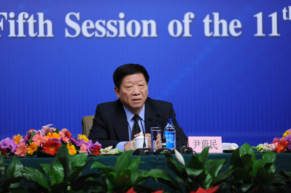 人力資源和社會保障部部長尹蔚民回答記者提問