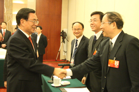 中共中央政治局常委、中央紀(jì)委書記賀國強看望人大福建代表團（組圖）