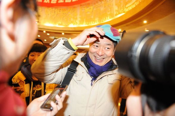 iPhone受寵！看看兩會記者的采訪工具