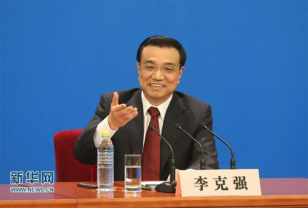 李克強(qiáng)：中國(guó)和平發(fā)展與維護(hù)主權(quán)兩條原則并行不悖