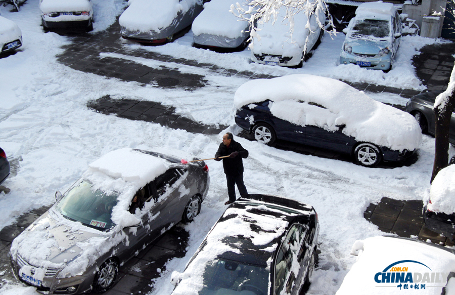 中國日?qǐng)?bào)直擊北京三月春雪