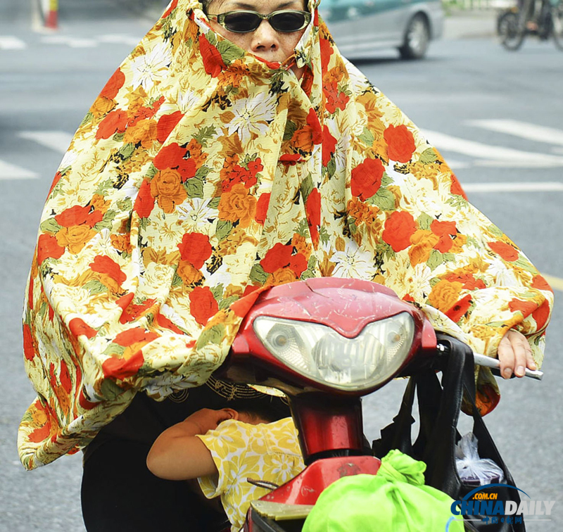 中國日?qǐng)?bào)聚焦全國多地高溫天氣
