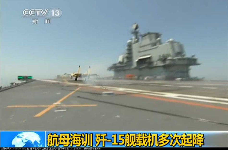 我航母出海試驗訓(xùn)練25天后返港 殲—15完成首次駐艦飛行