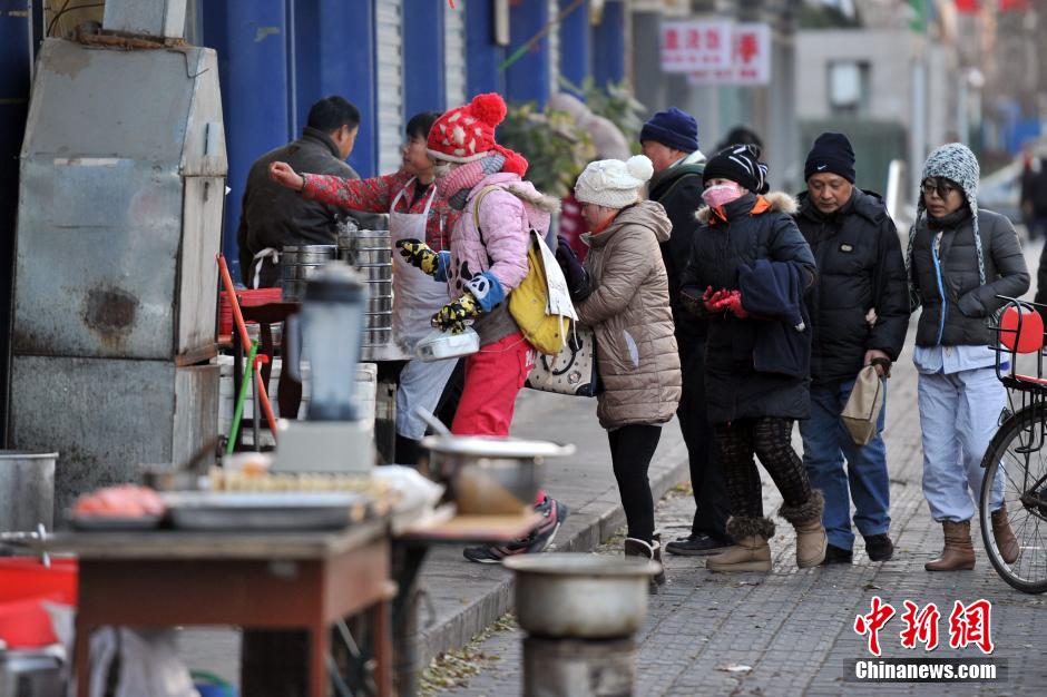 中國多地大風(fēng)降溫 京城迎入冬最冷一天