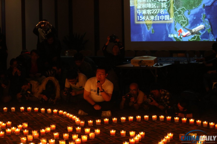 馬航MH370失聯(lián)客機整月 家屬為親人祈福守望