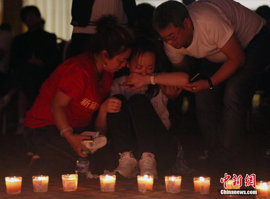 MH370航班失聯(lián)滿月 在京乘客家屬舉行祈?；顒?dòng)