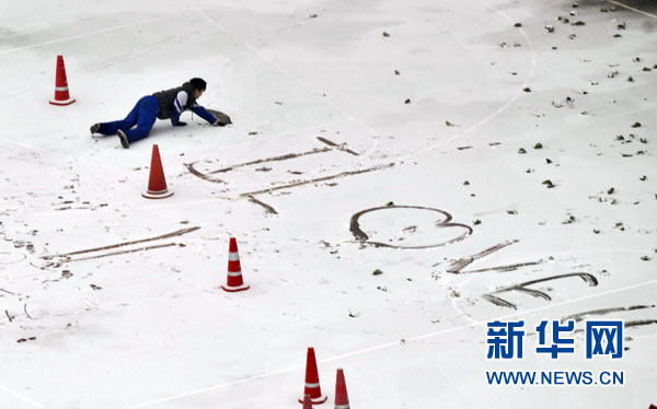 北京飄落今冬首場雪預計中午結(jié)束