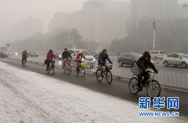 北京飄落今冬首場雪預計中午結(jié)束
