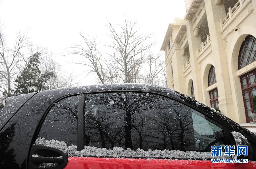 “雪花紛飛看京城”：北京大部地區(qū)迎來降雪
