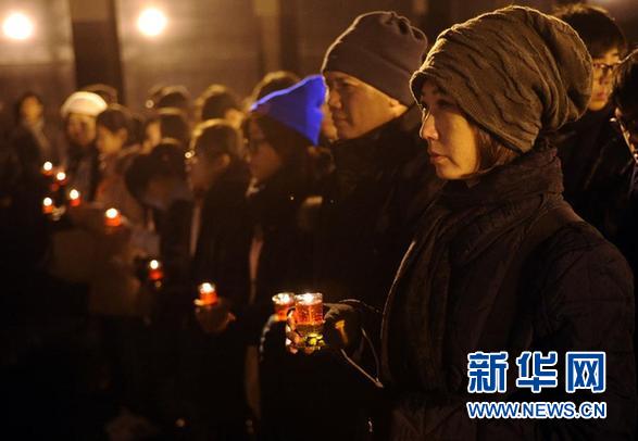 南京為大屠殺遇難者舉行“和平燭光祭”（圖）