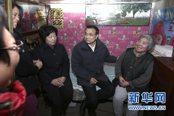 習(xí)近平李克強(qiáng)寒冬問(wèn)民生