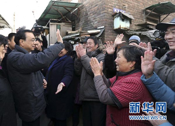 習(xí)近平李克強(qiáng)寒冬問(wèn)民生