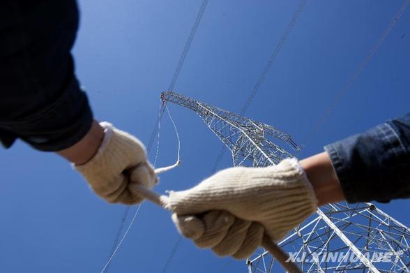 疆電外送工程實現(xiàn)“煤從空中走、電送全中國”