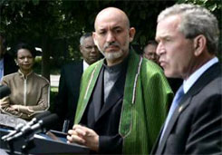 Bush touts Afghanistan as model for Iraq