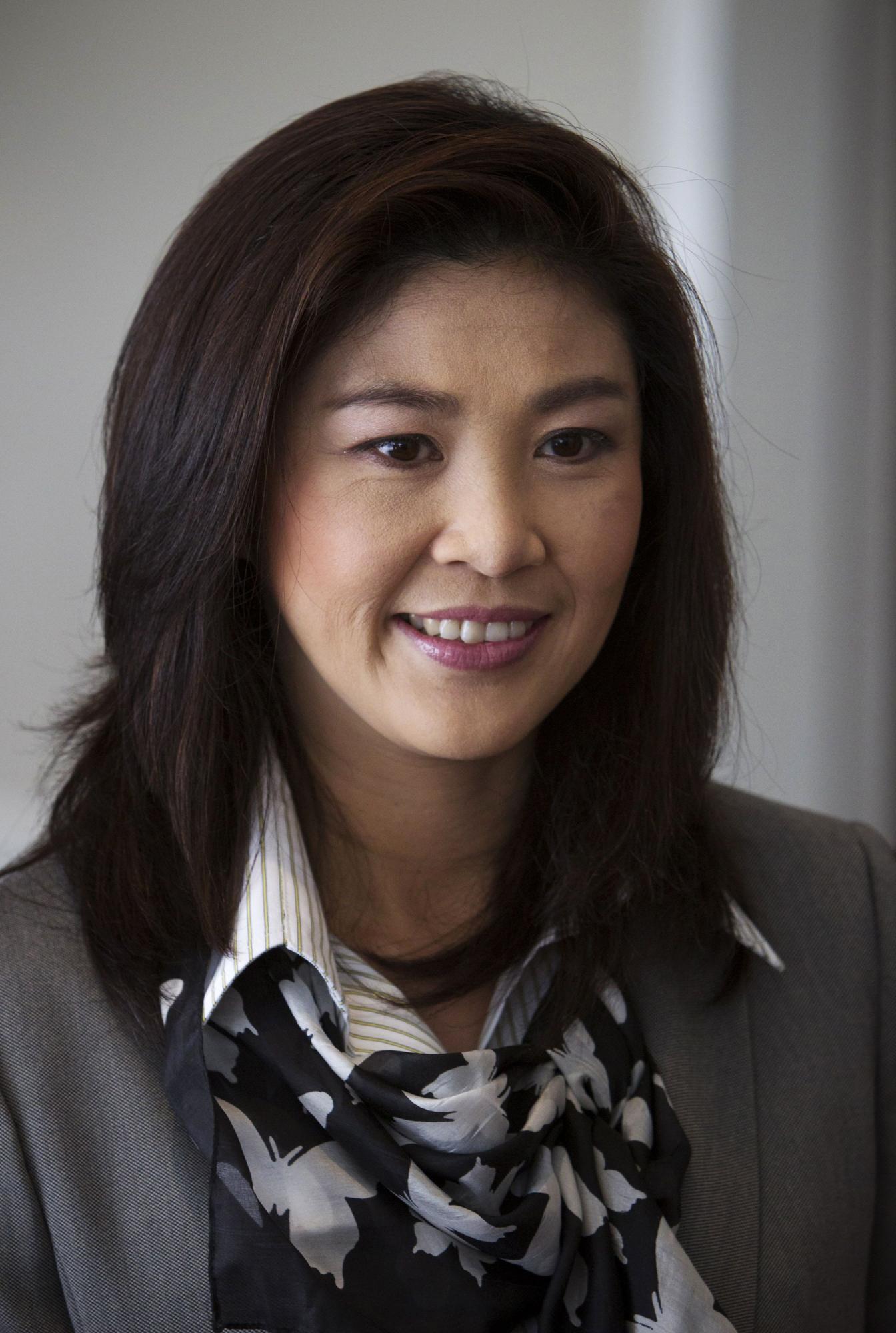 阿披實(shí)辭黨首 他信妹妹將成泰國(guó)首位女總理