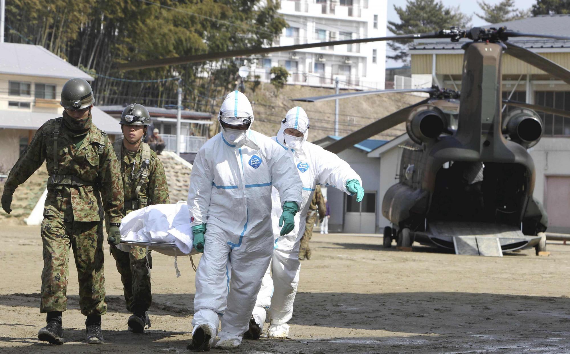 日本進行最大規(guī)模救援 中國首次派出救援隊赴日