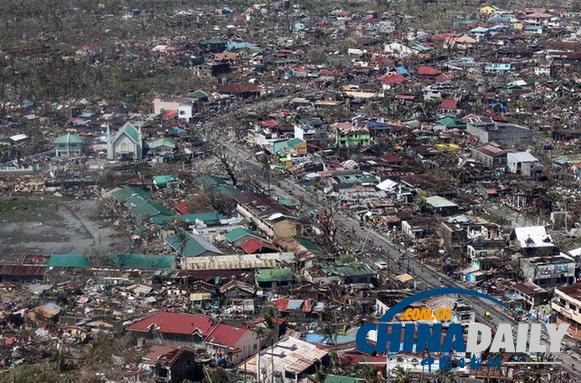 菲律賓災(zāi)民搶劫米倉 墻體倒塌8人死亡