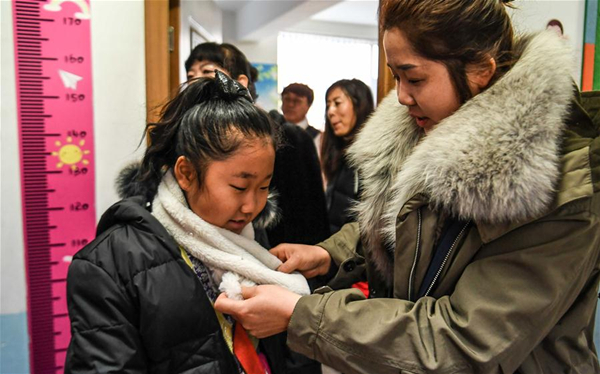Leftover children look forward to family reunion before Spring Festival