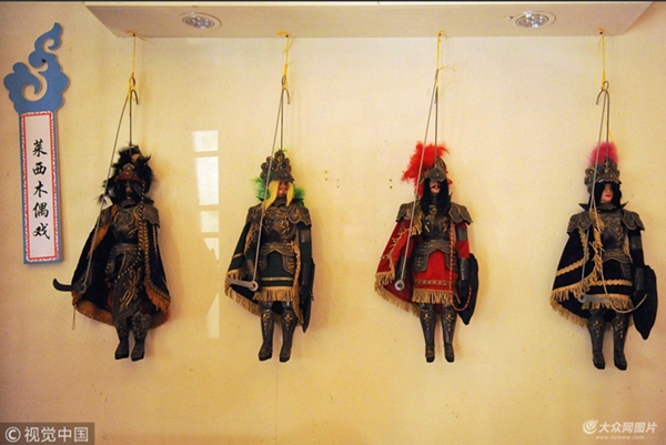 In pics: Laixi continues puppet legacy