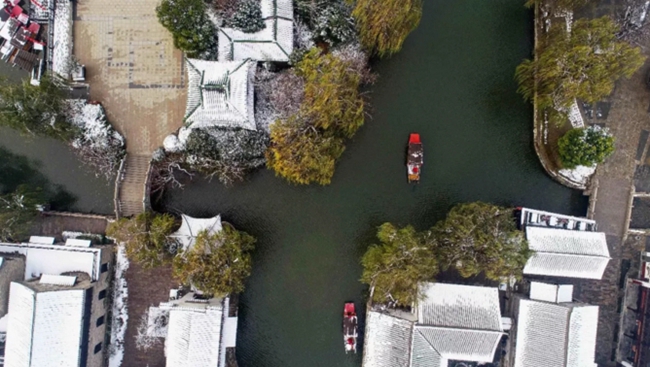 In pics: snow adorns Taierzhuang ancient town