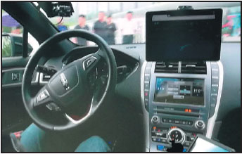 Baidu chief takes spin in a self-driving car