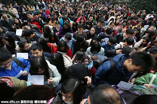 City's degree restriction for civil service exam divides opinions