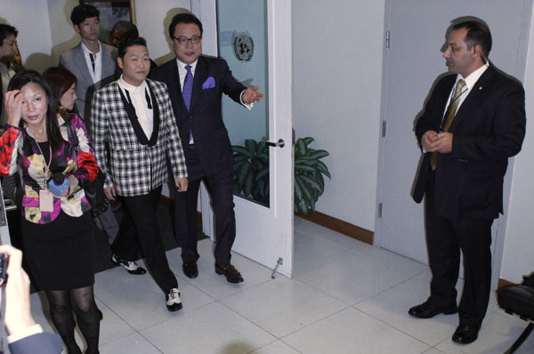 Ban practices 'Gangnam Style' dance steps with Psy