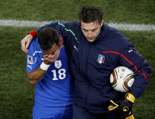 Holders Italy make exit, Japan go through