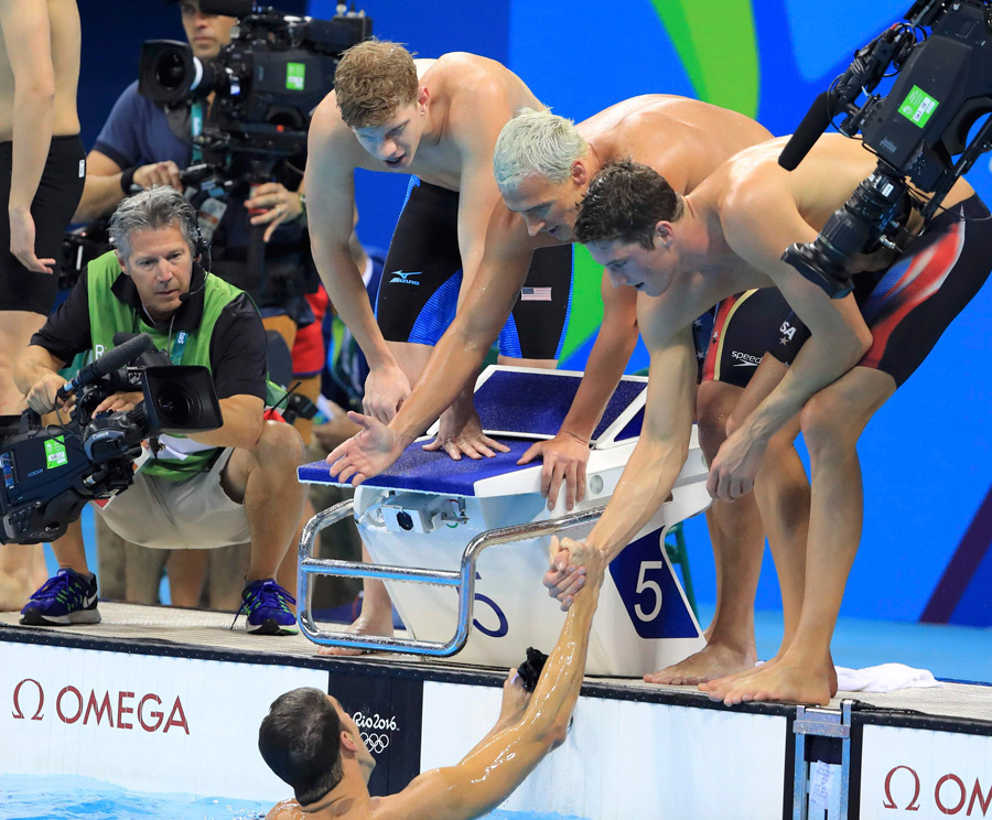 Phelps adds Olympic gold medal haul to historic 21