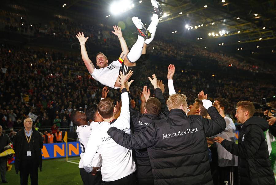 Podolski gets perfect send-off with winning goal for Germany