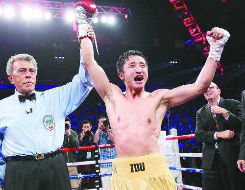 鄒市明重拳擊出中國(guó)奧運(yùn)選手新出路