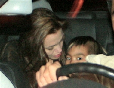 Jolie leaves Vietnam with boy