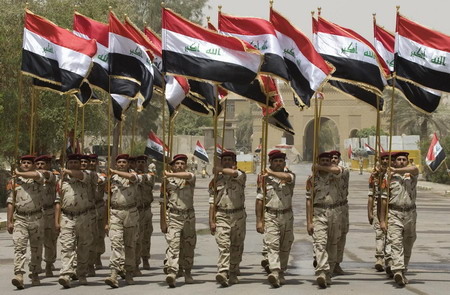 Fireworks over Baghdad as Iraqis take over cities