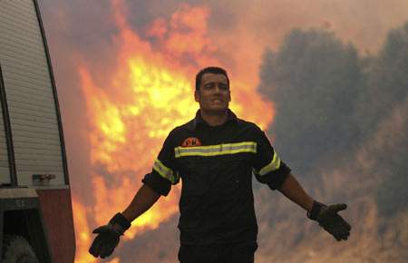 Dozens of wildfires reported in Greece