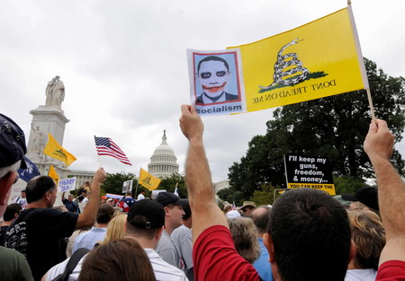 Thousands of downtown DC protesters blast Obama