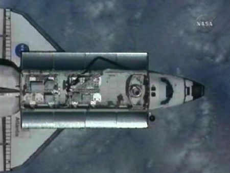 Shuttle Atlantis arrives at space station