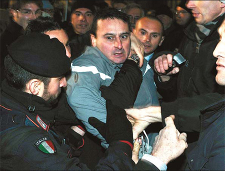 Berlusconi attacker apologizes for 'cowardly' act
