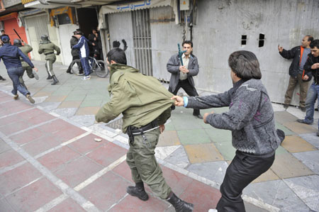 Eight killed in Tehran clashes: state TV