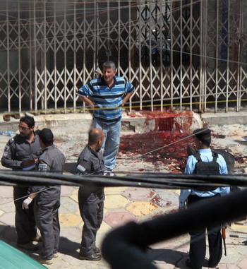 Brazen Baghdad gold heist ends in 15 dead